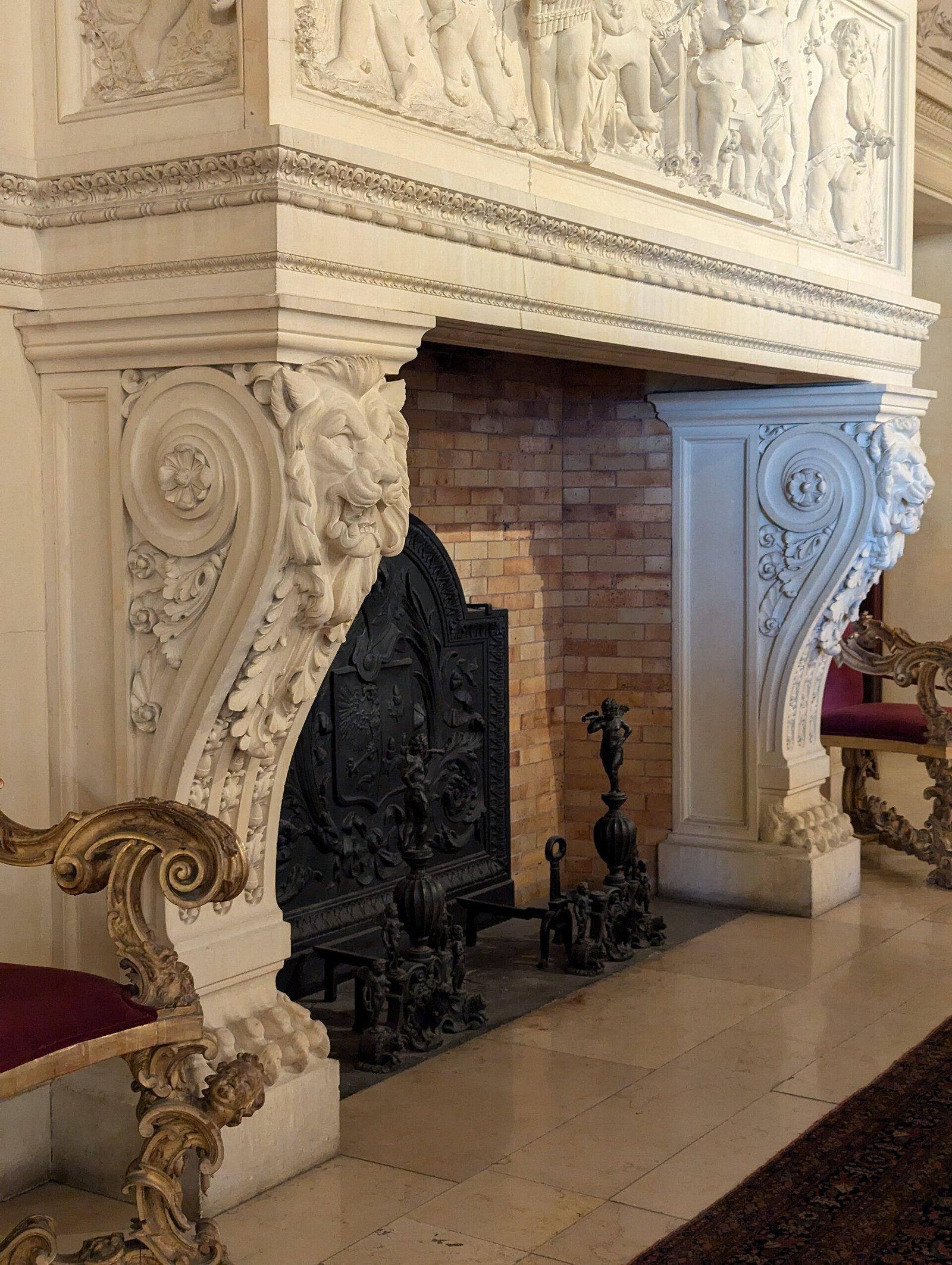 A carved fireplace inside The Breakers mansion in Newport, Rhode Island