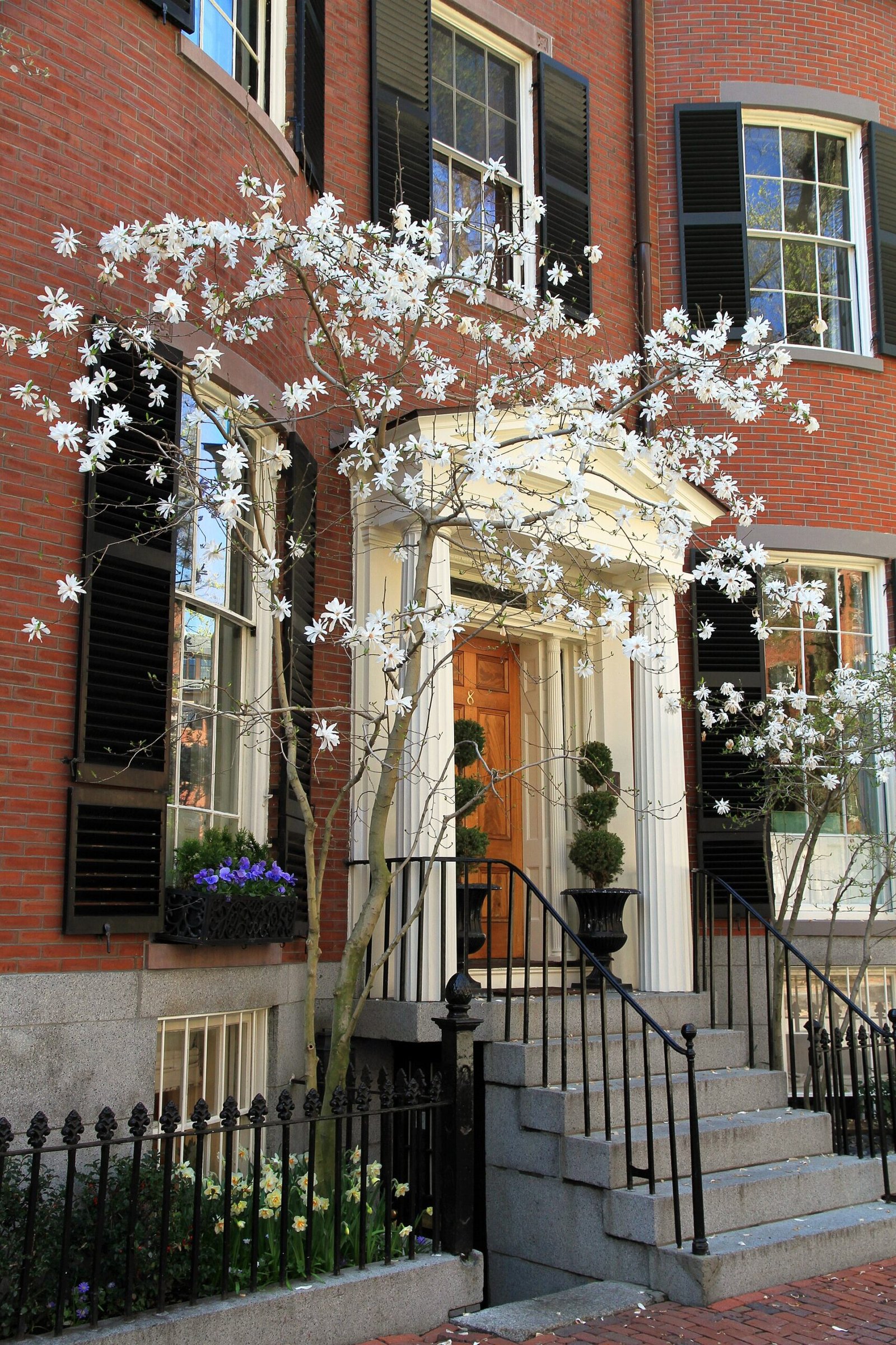 Gas lamps and brick sidewalks on a Beacon Hill street