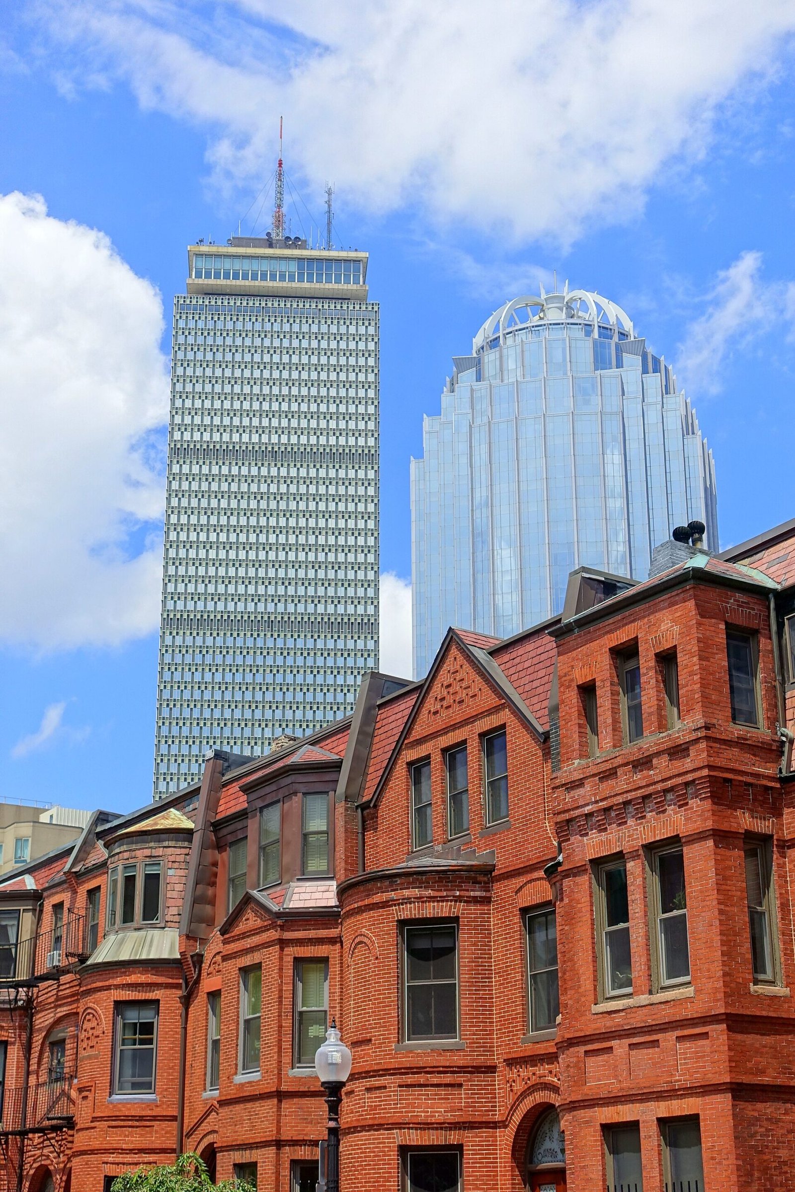Bow-front row houses in the South End below the Prudential Tower