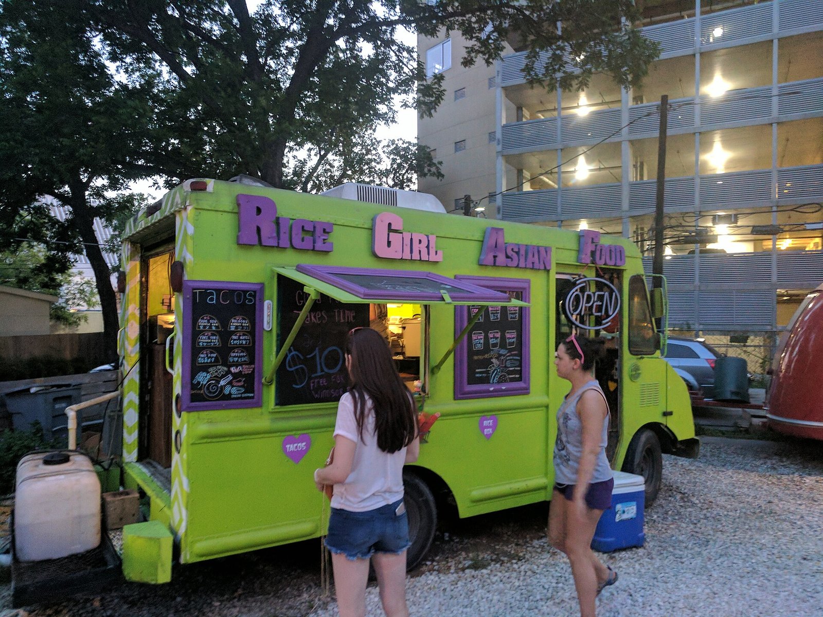 Customers ordering at a food truck in Austin, Texas
