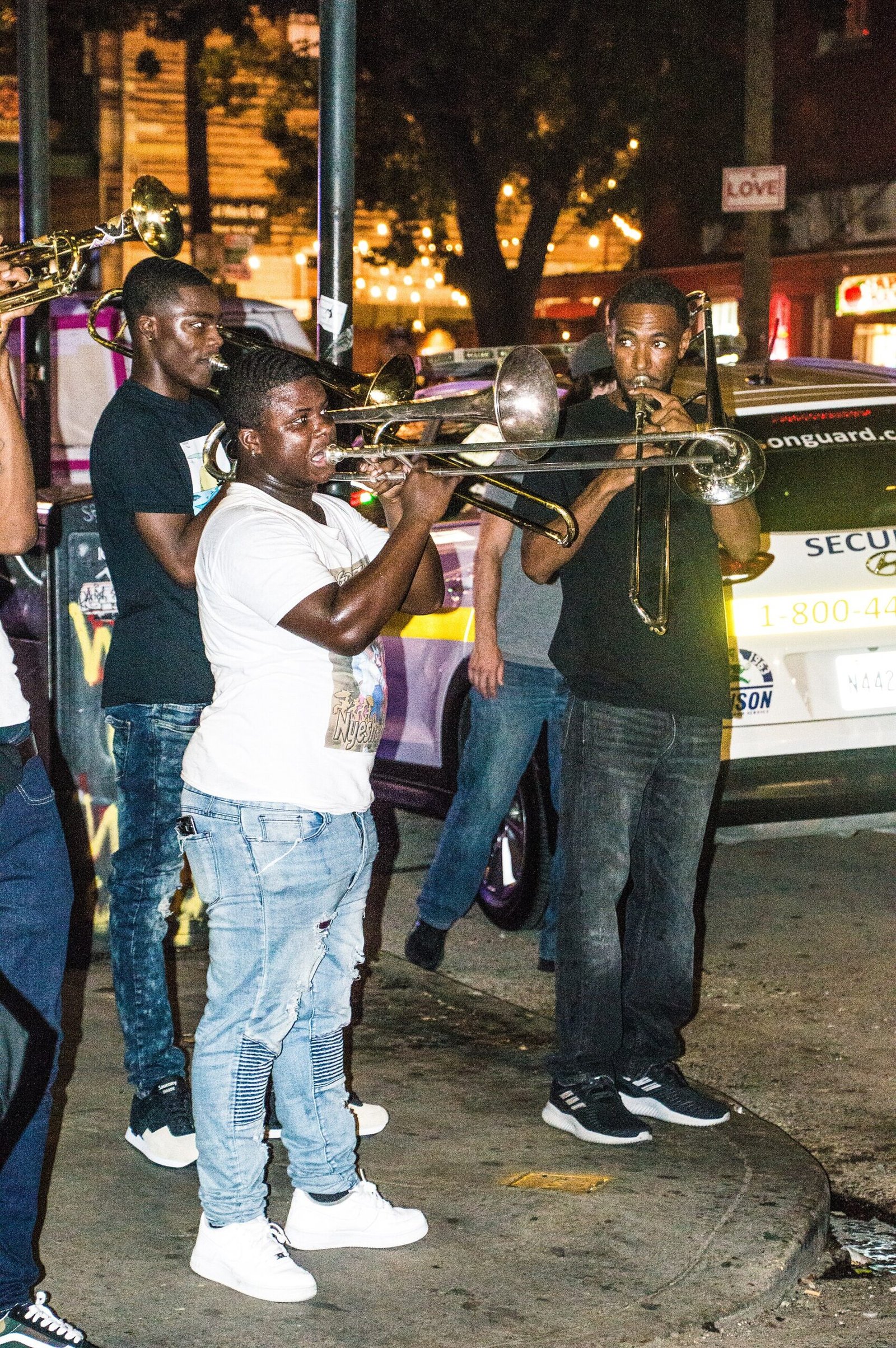 Street musicians playing on Frenchmen Street at night