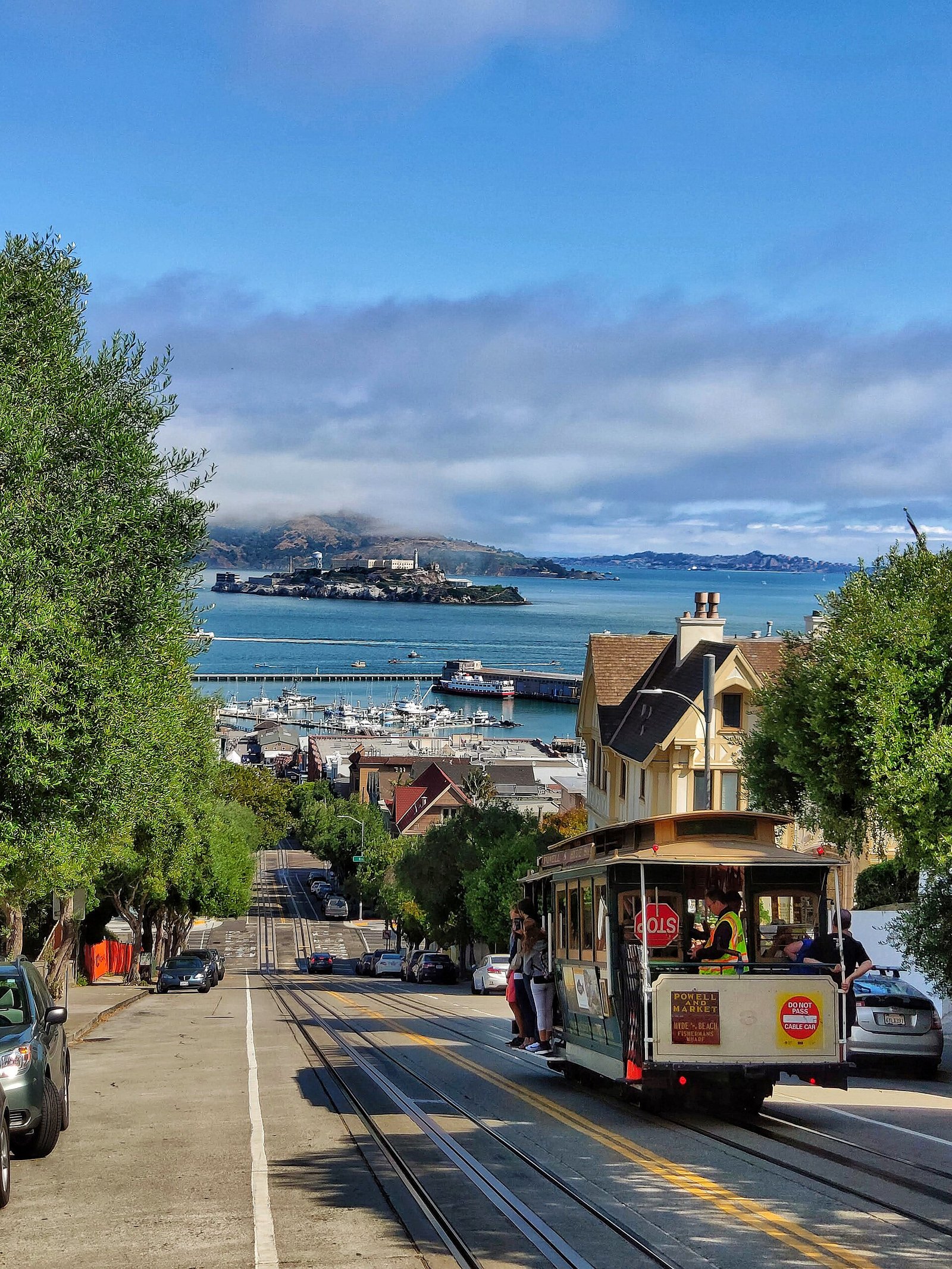 A San Francisco cable car climbing a steep hill