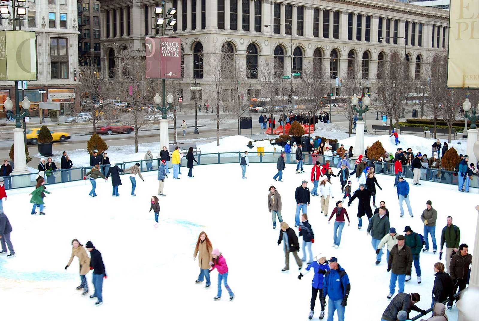 Ice skaters on the rink in Millennium Park, Chicago