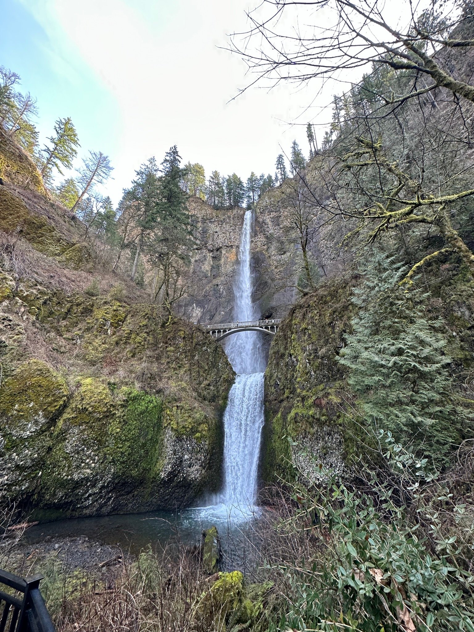 Multnomah Falls and its stone footbridge in the Columbia River Gorge