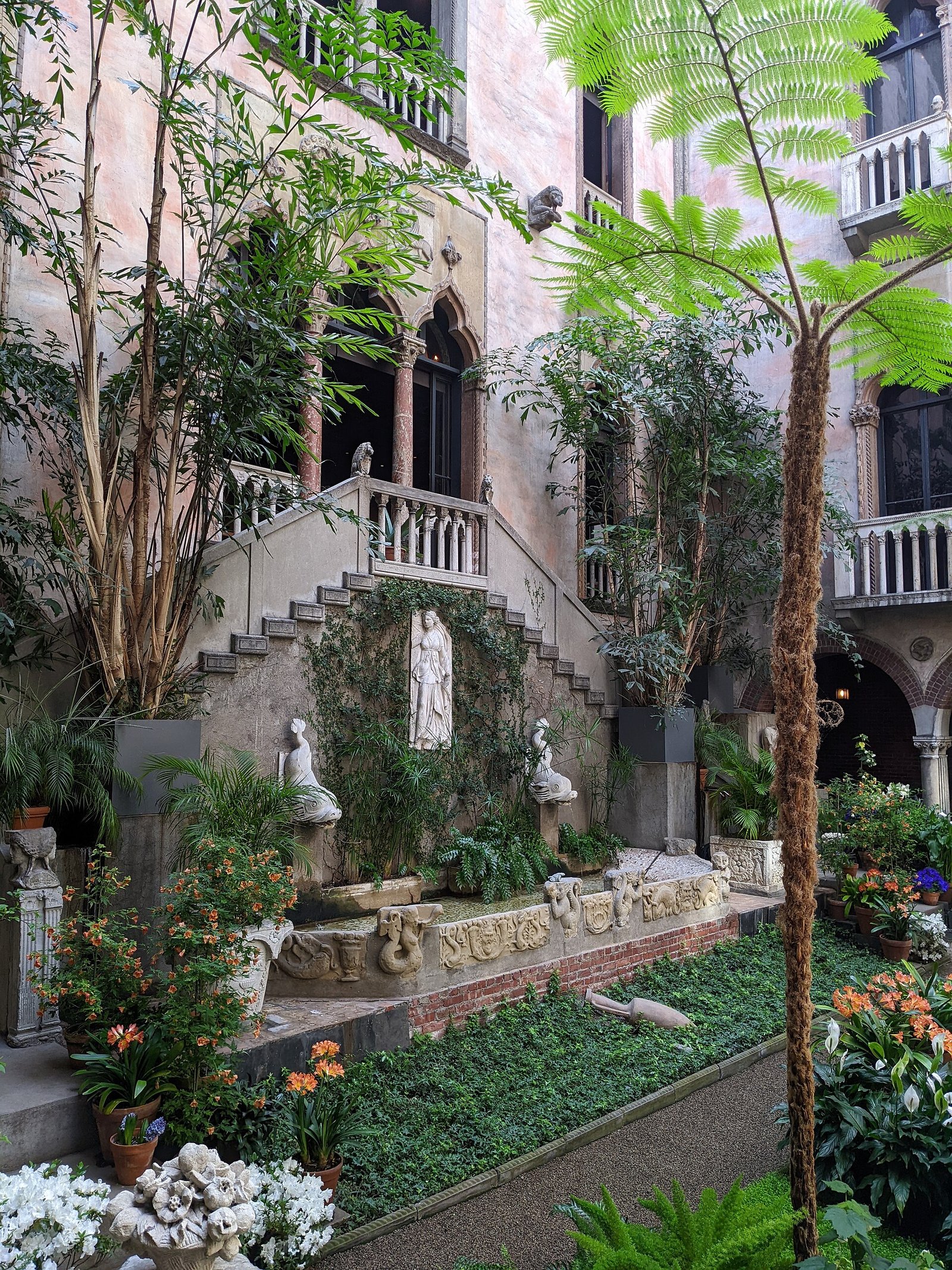 The flowering courtyard inside the Isabella Stewart Gardner Museum