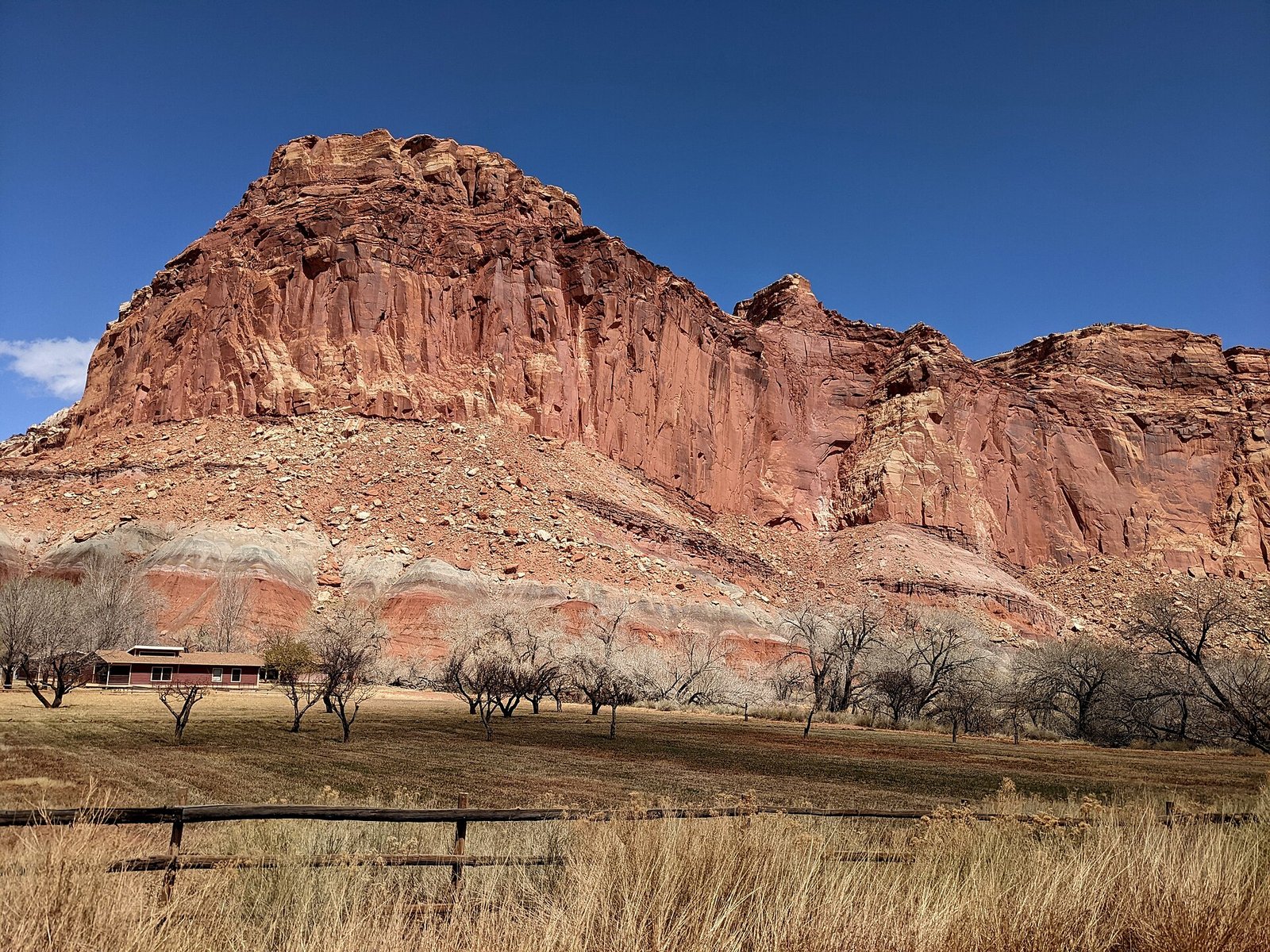 Sandstone cliffs above the orchards of Fruita in Capitol Reef National Park