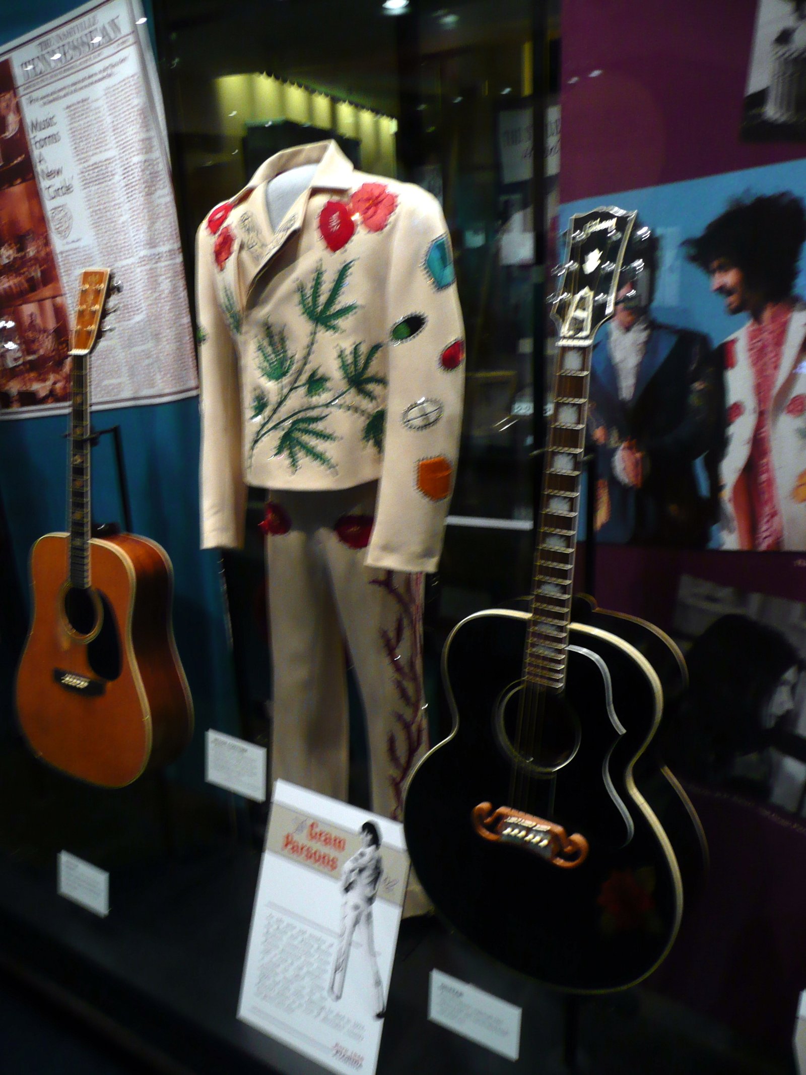 Stage costumes and guitars inside the Country Music Hall of Fame