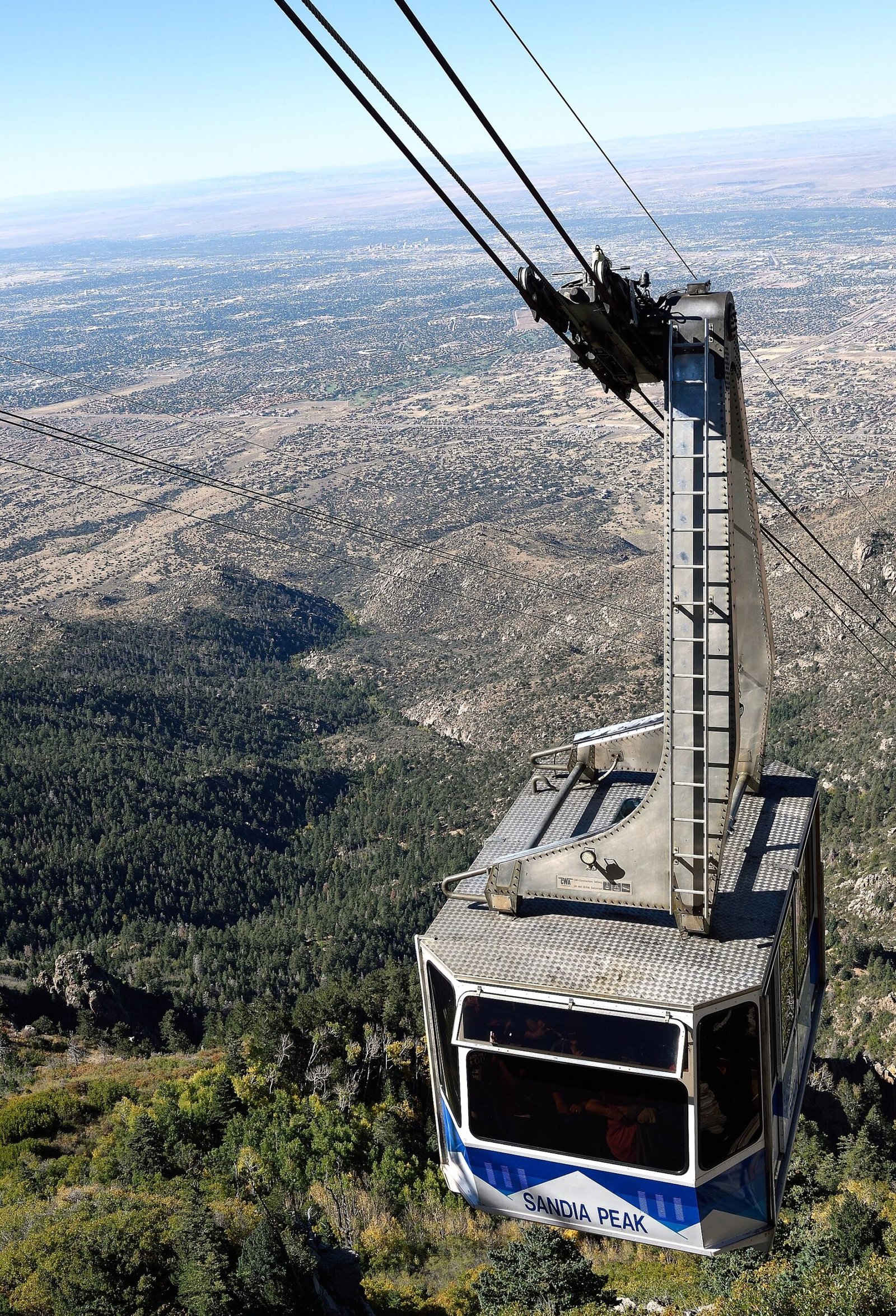 A Sandia Peak Tramway car climbing above the desert outside Albuquerque