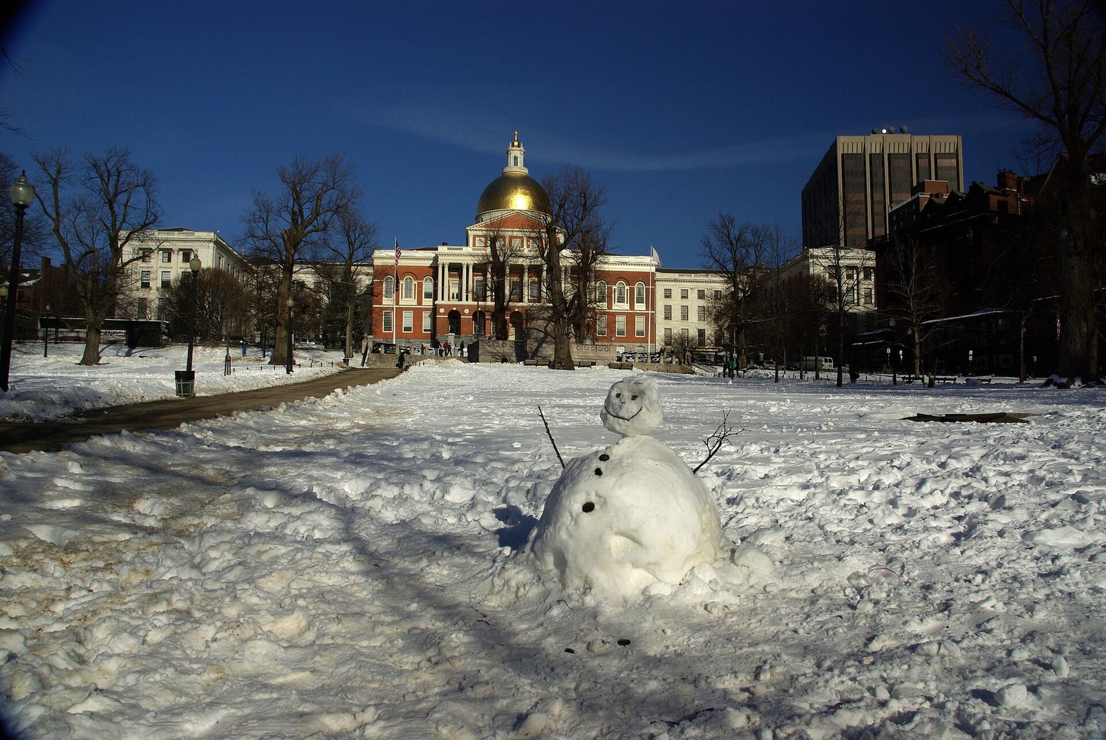 Snow on Boston Common with the Massachusetts State House behind