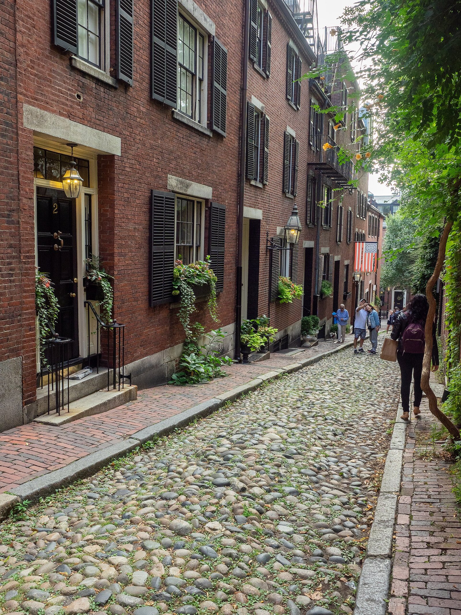 Brick row houses and cobblestones on Acorn Street in Beacon Hill
