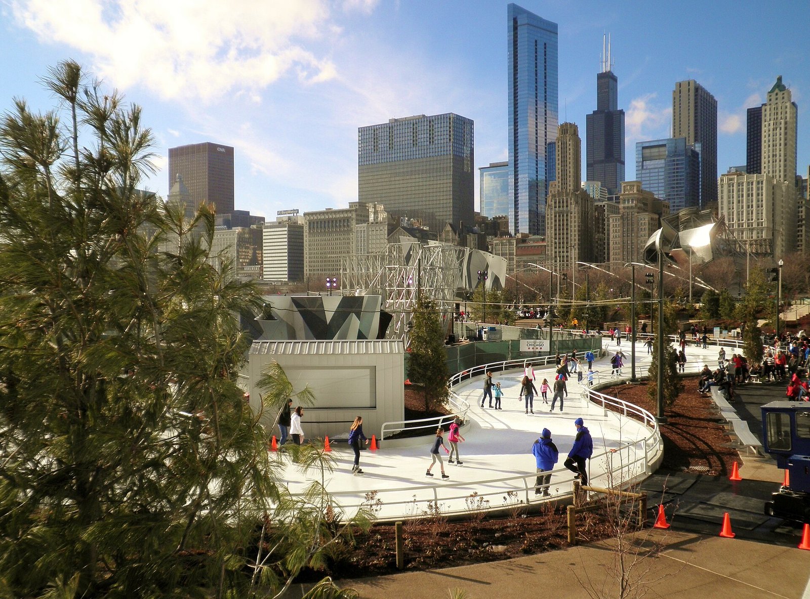 Skaters on the ice ribbon at Maggie Daley Park in Chicago