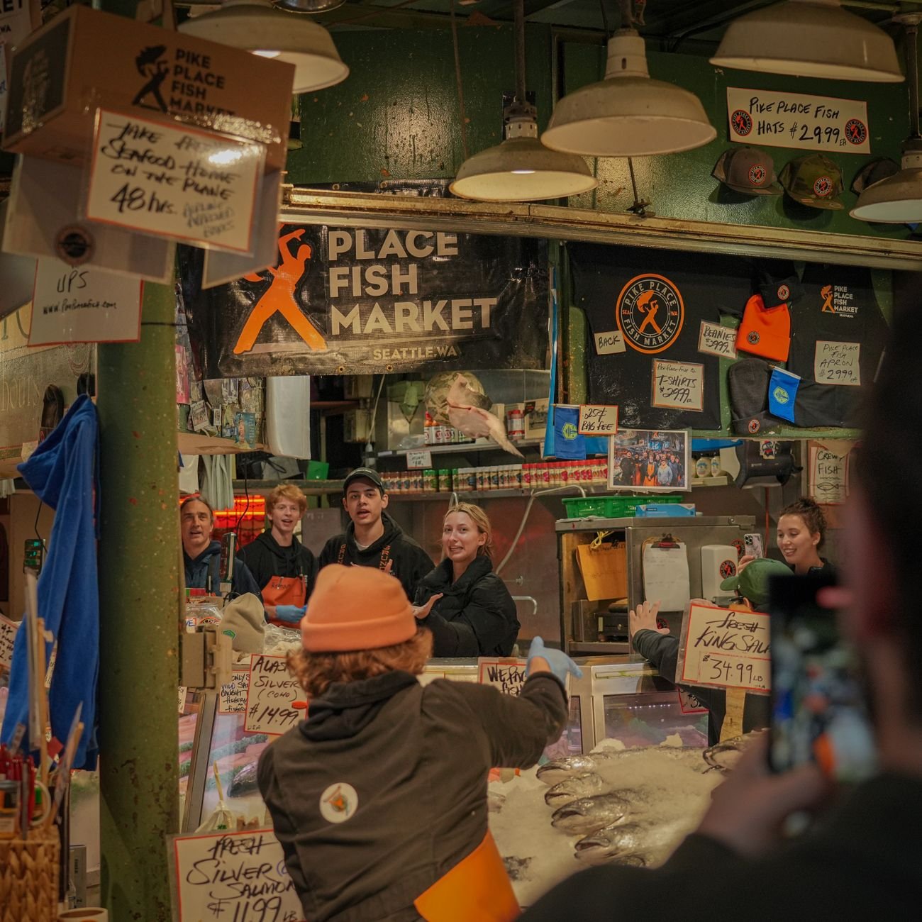 Market stalls and the neon sign at Pike Place Market