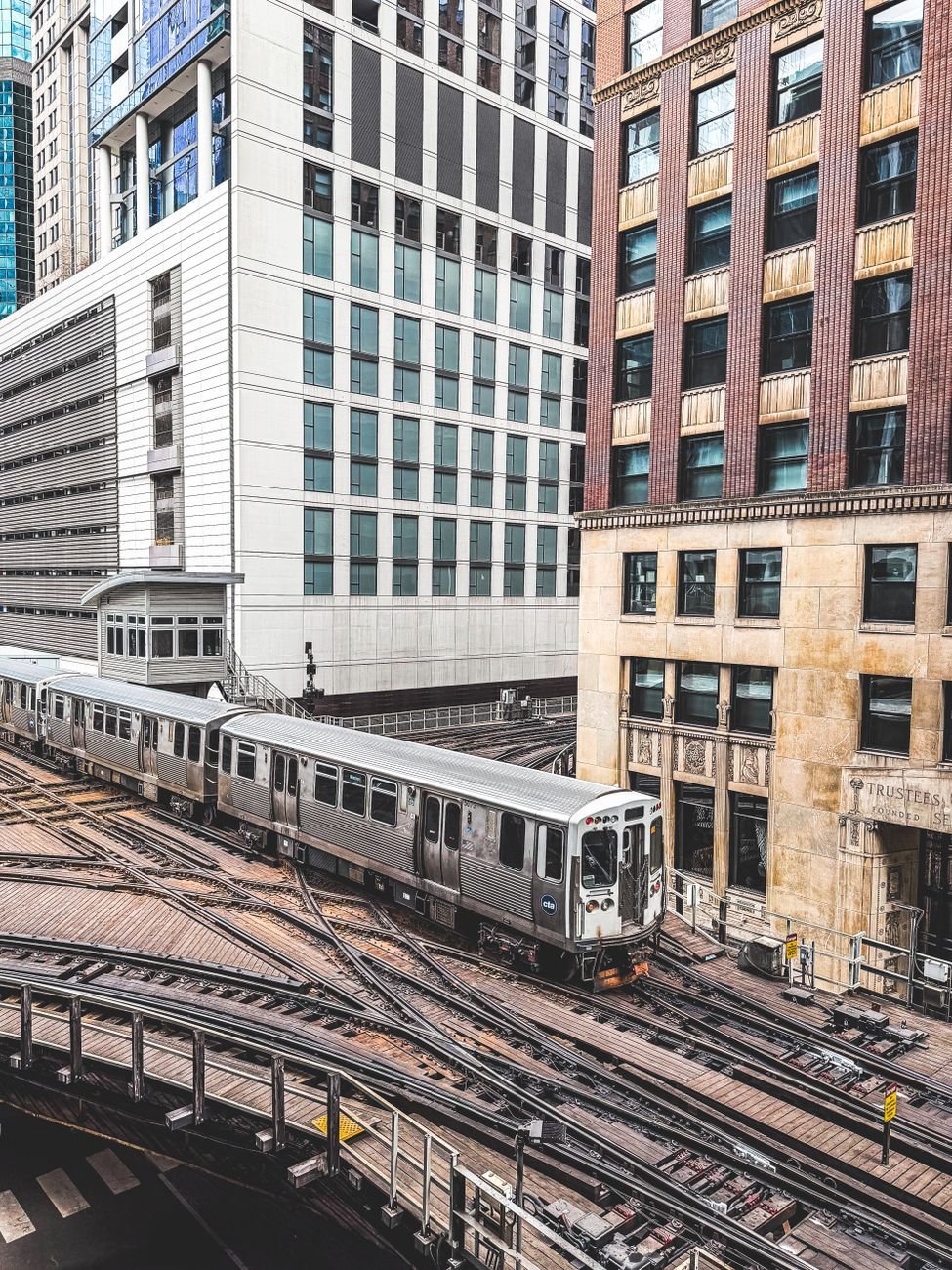 An elevated L train on the Loop tracks in downtown Chicago