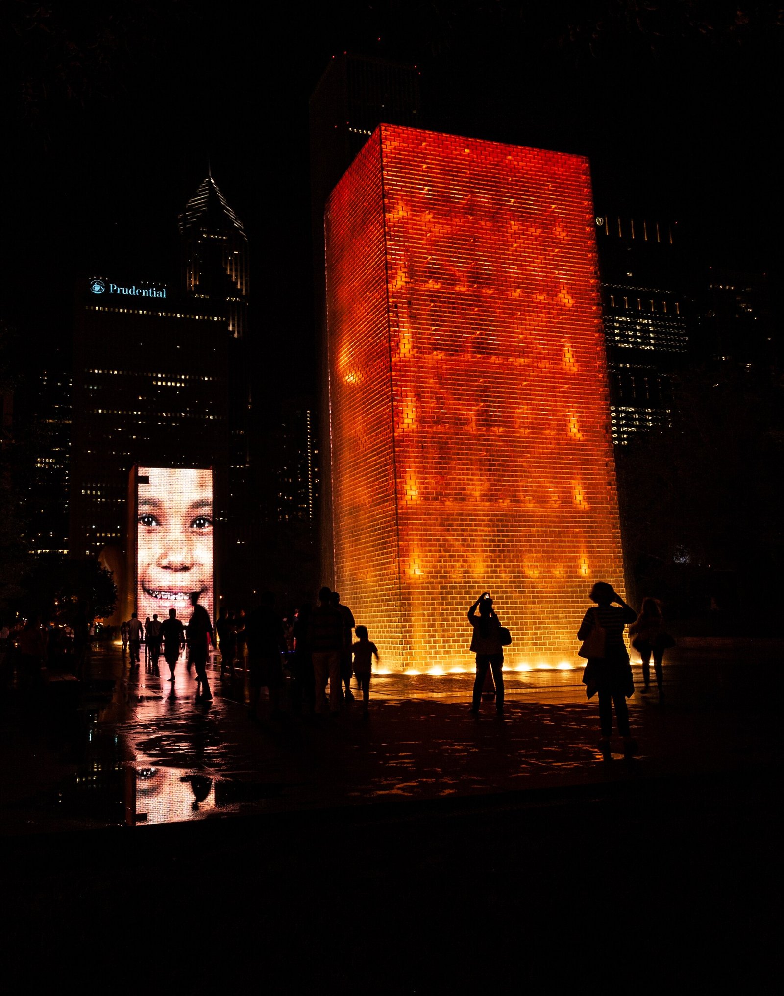 The Crown Fountain lit up at night in Millennium Park